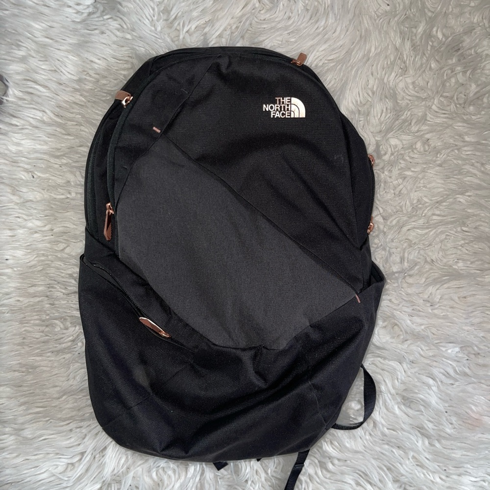 Black North Face Backpack With Rose Gold Detail